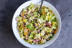 Mexican Tuna salad in a bowl with dressing.