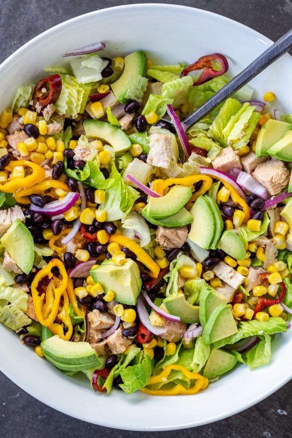 Mexican Tuna salad in a bowl with a spoon.