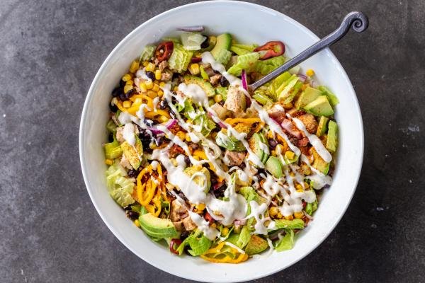 Mexican Tuna salad in a bowl with dressing.