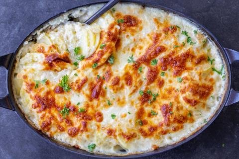 Baked Scalloped Potatoes in pan.