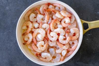 Cooked shrimp in a pan.