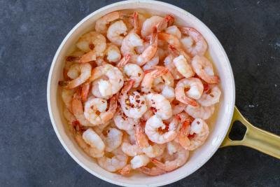 Shrimp with seasoning in a pan with.