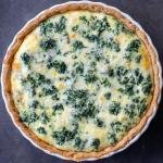 Baked Spinach Quiche in a pan.