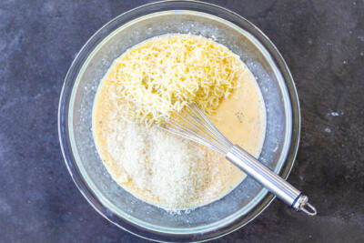 Quiche ingredients in a bowl together.