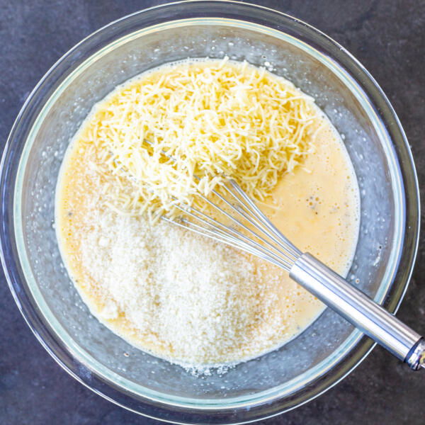 Quiche ingredients in a bowl together.