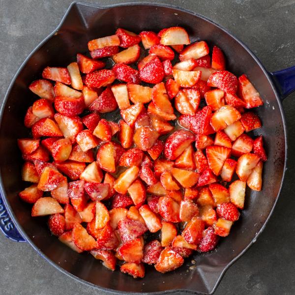 Chopped strawberries in a pan.