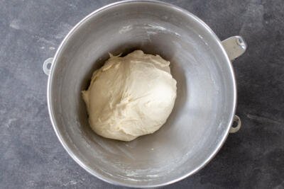 Kneaded Khachapuri dough in a mixing bowl.