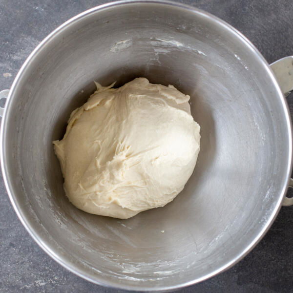 Kneaded Khachapuri dough in a mixing bowl.