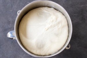 Khachapuri dough in a mixing bowl.