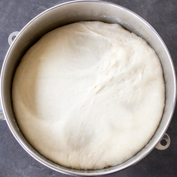 Khachapuri dough in a mixing bowl.