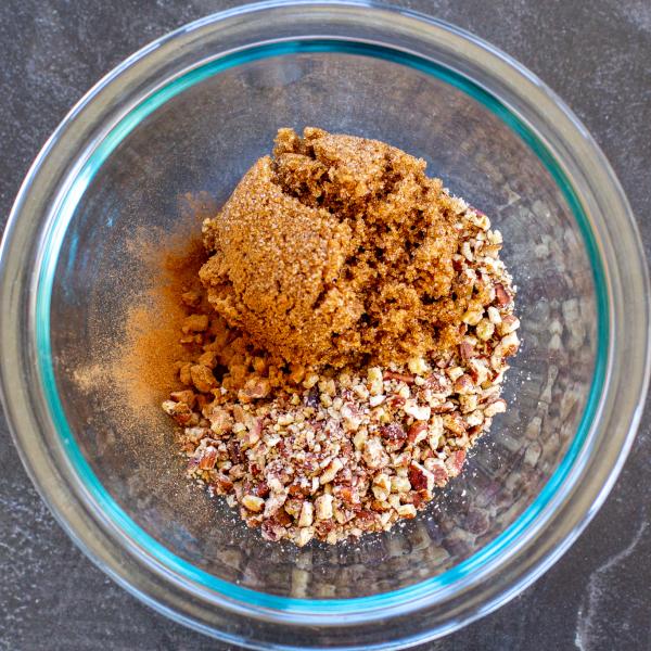 Brown sugar with pecans in a bowl.