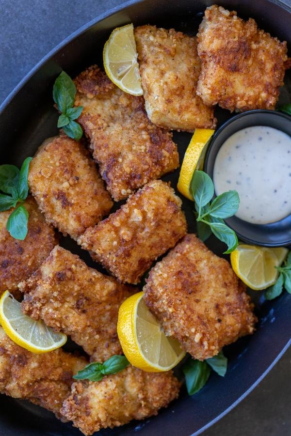 Cooking fresh fish fried BBQ with a delicious crispy golden crust