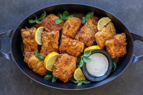 Crispy Panko Fish on a plate with ranch.