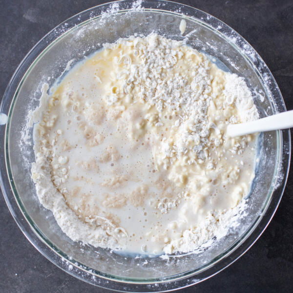 Liquids added to flour mixture.