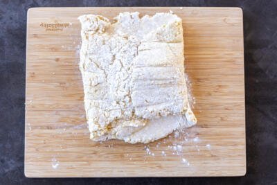 Pastry dough on a cutting board.
