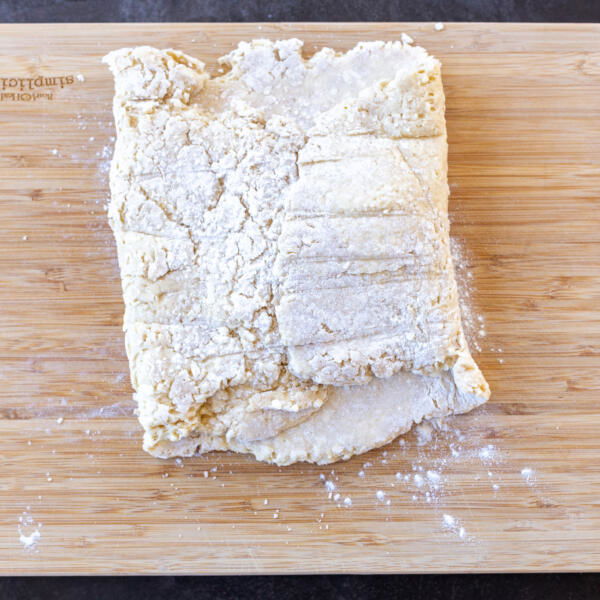 Pastry dough on a cutting board.
