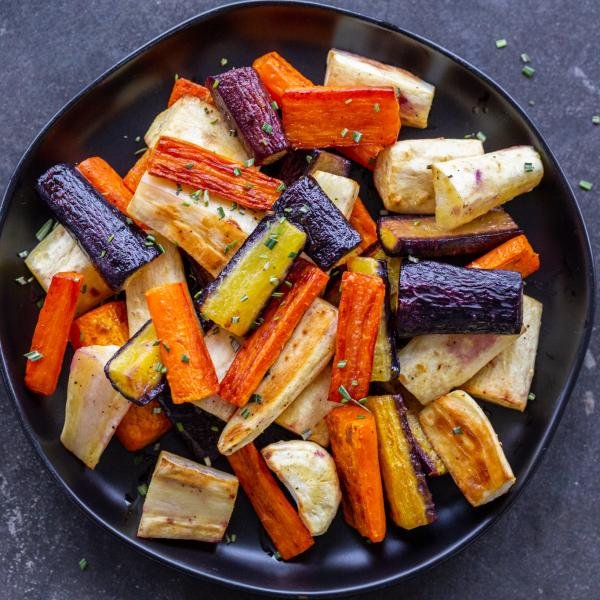 Plate with Roasted Carrots And Parsnips.