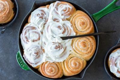 Cinnamon rolls with a cream cheese topping.