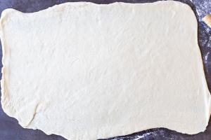 Rolled out dough for cinnamon rolls.