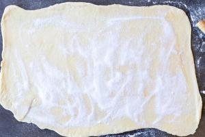 Sugar applied to the cinnamon rolls dough.
