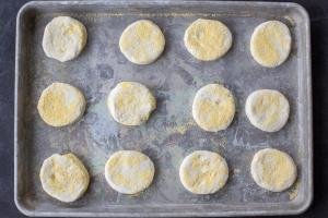 Cut out English Muffins on a baking sheet.