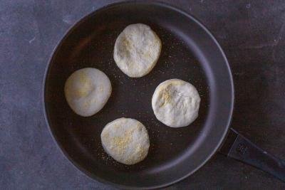 Frying pan with English muffins.