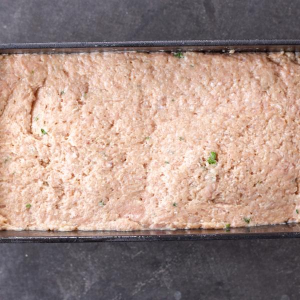 Meatloaf ingredients in a baking pan.