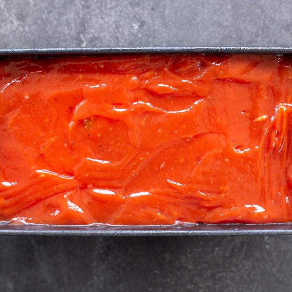 Meatloaf with ketchup on top.