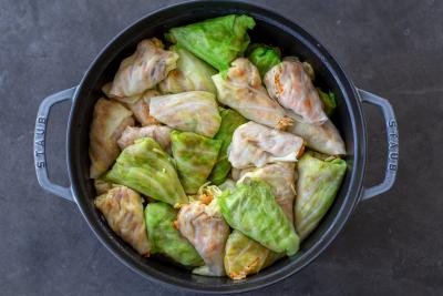 Cabbage rolls in a cooking pot.