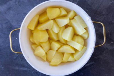 Cooked potatoes in a pot.