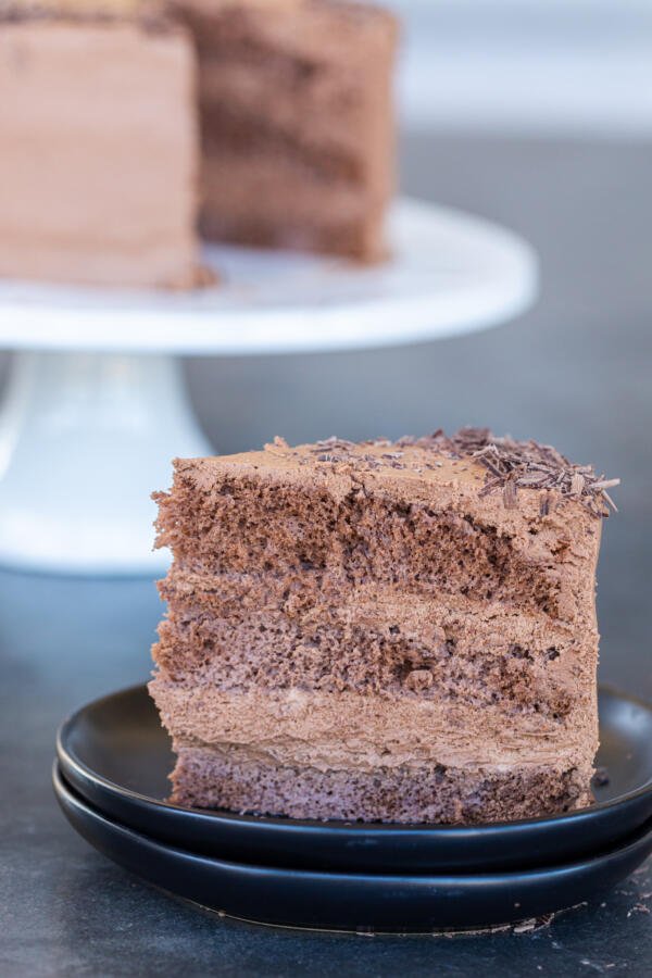 Boozy Chocolate Liqueur cake slice on a plate.