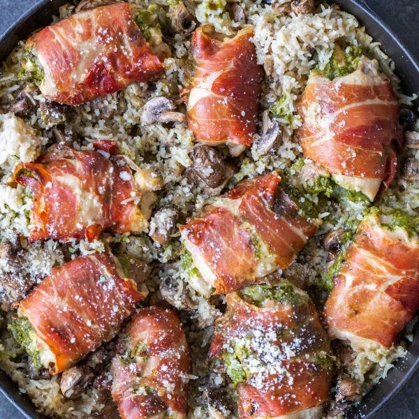 Baked Prosciutto Wrapped Chicken with rice and mushrooms.