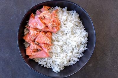 Rice with salmon in a bowl.