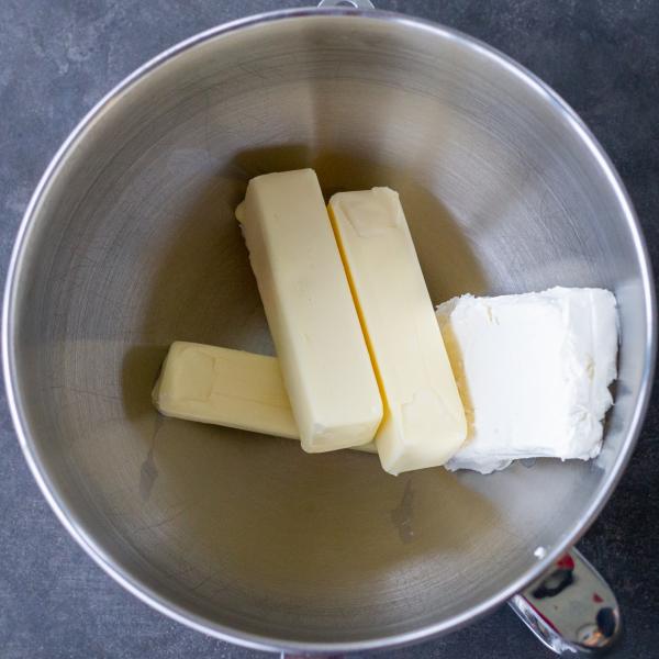 Butter and cream cheese in a mixing bowl.