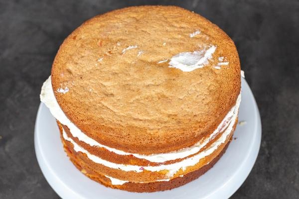 Layered cake on a stand.
