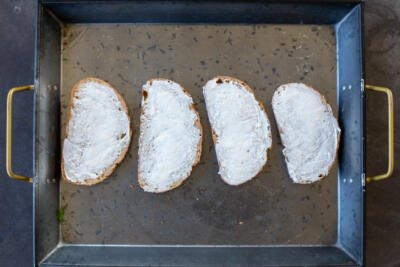 Toast with cream cheese spread.