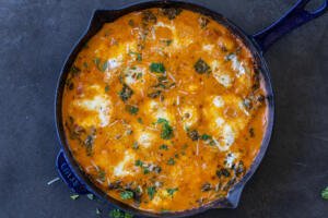 Creamy Cheesy Baked Gnocchi in a pan.