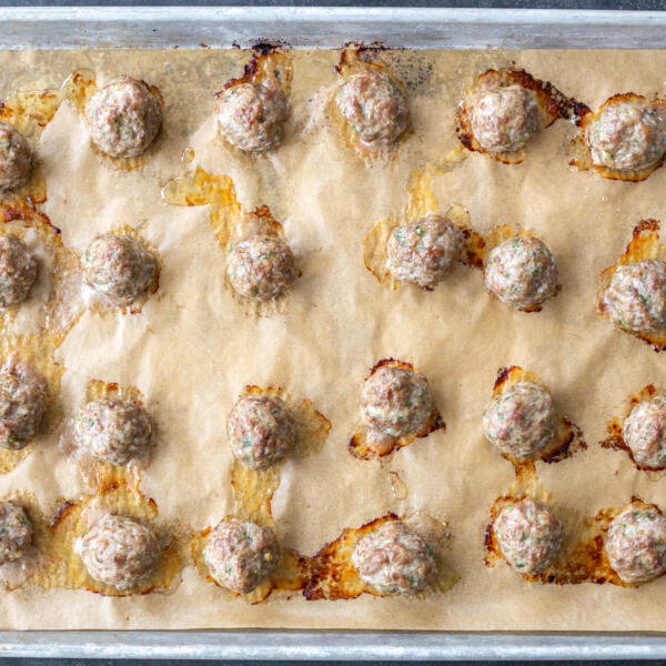 Baked Lamb Meatballs on a baking sheet.