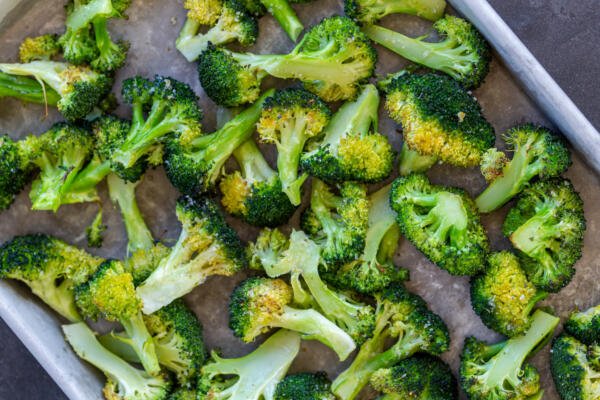 Roasted Broccoli on a baking sheet.