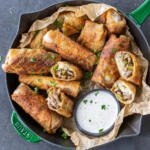 Philly Cheesesteak Egg Rolls with ranch sauce.