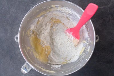 Liquids combined with dry ingredients in a bowl.