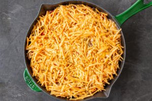 Hashbrown Breakfast Casserole with cheese and eggs added.