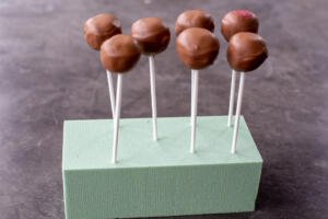 Cake pops on a stand.