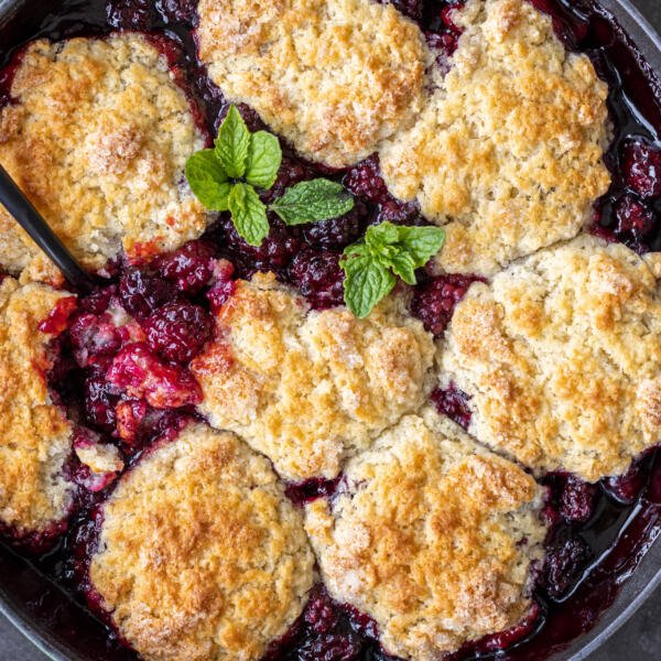Baked black berry cobbler in a pan.