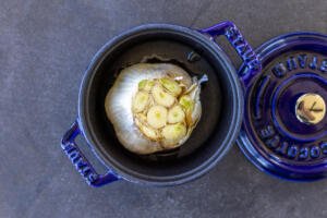Garlic in a baking pan.