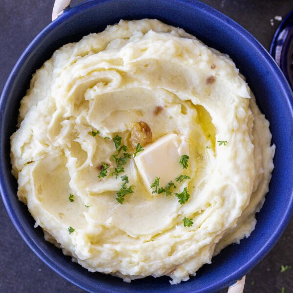 Garlicky mashed potatoes with herbs and butter.