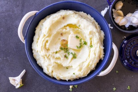 Mashed potatoes with a slice of butter.