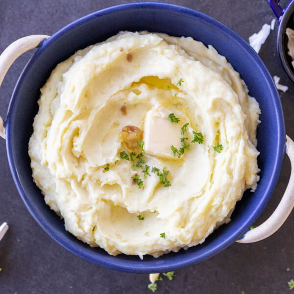 Mashed potatoes with a slice of butter.