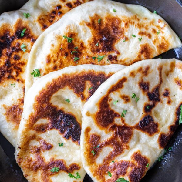 Imeruli Khachapuri sliced in halves.