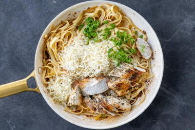 Pasta with chicken, parmesan and herbs.